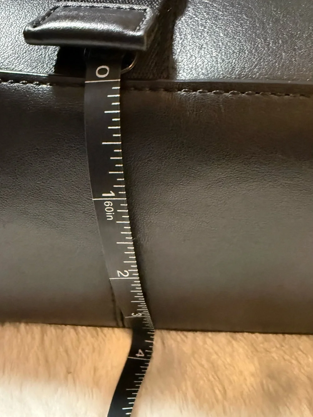 Coach messenger perforated